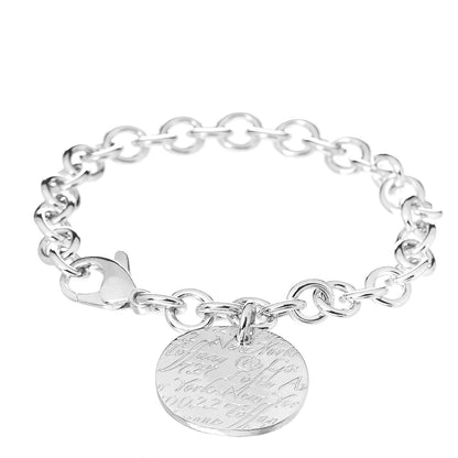 Tiffany Sterling Silver Notes Round Tag Charm Bracelet 1 of 4