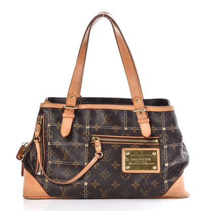 Louis Vuitton Monogram Riveting 1 of 11