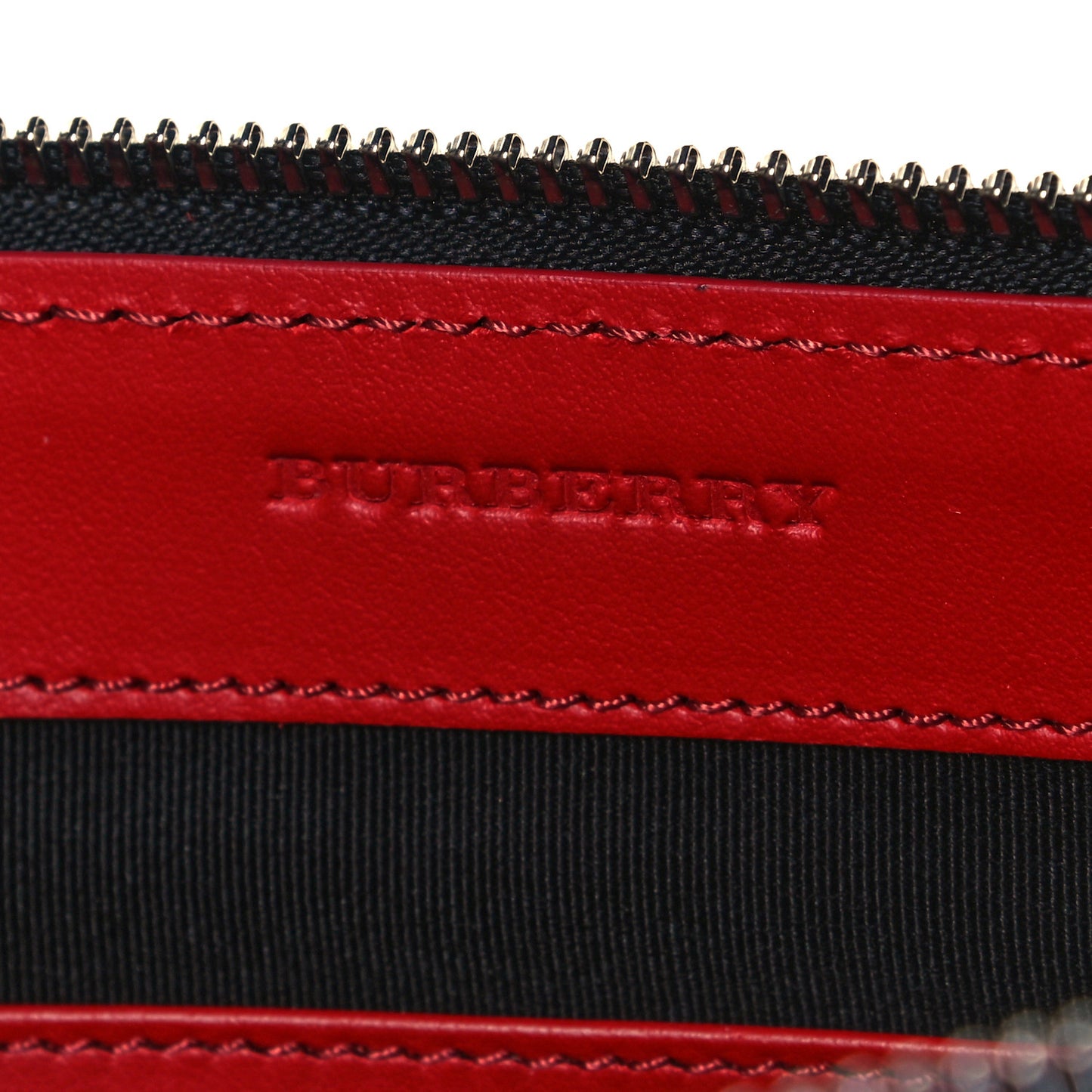 Calfskin Perforated Check Edin Zip Pouch Rust