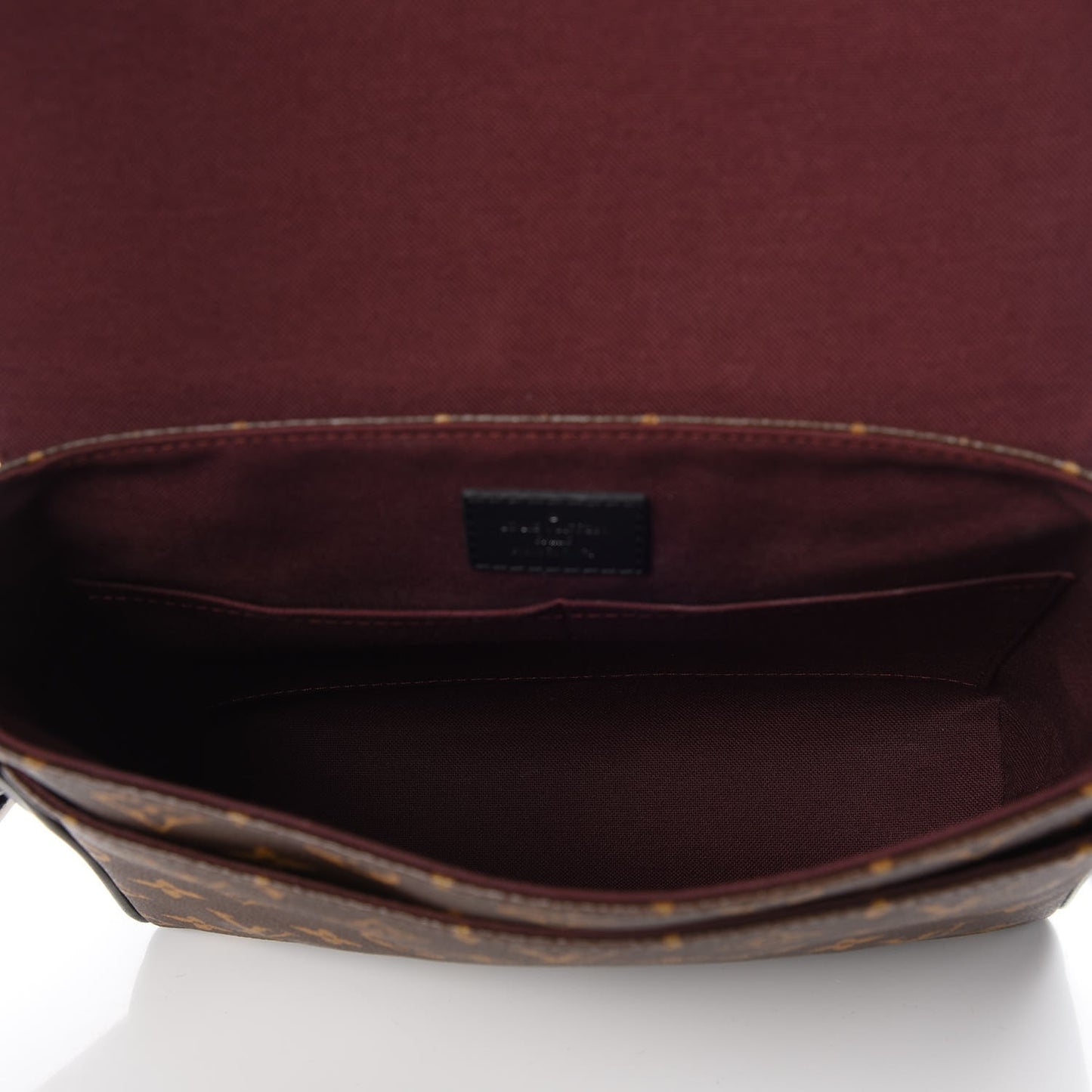 Monogram Macassar District PM