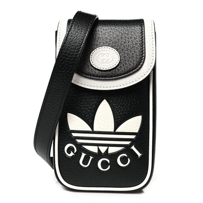 Gucci X ADIDAS Textured Dollar Calfskin Trefoil Embossed Phone Crossbody Bag Black Off White 1 of 10