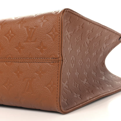 Louis Vuitton Empreinte Monogram Onthego MM Cognac 9 of 10
