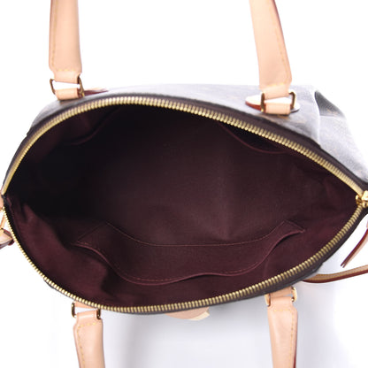 Louis Vuitton Monogram Rivoli MM 5 of 11