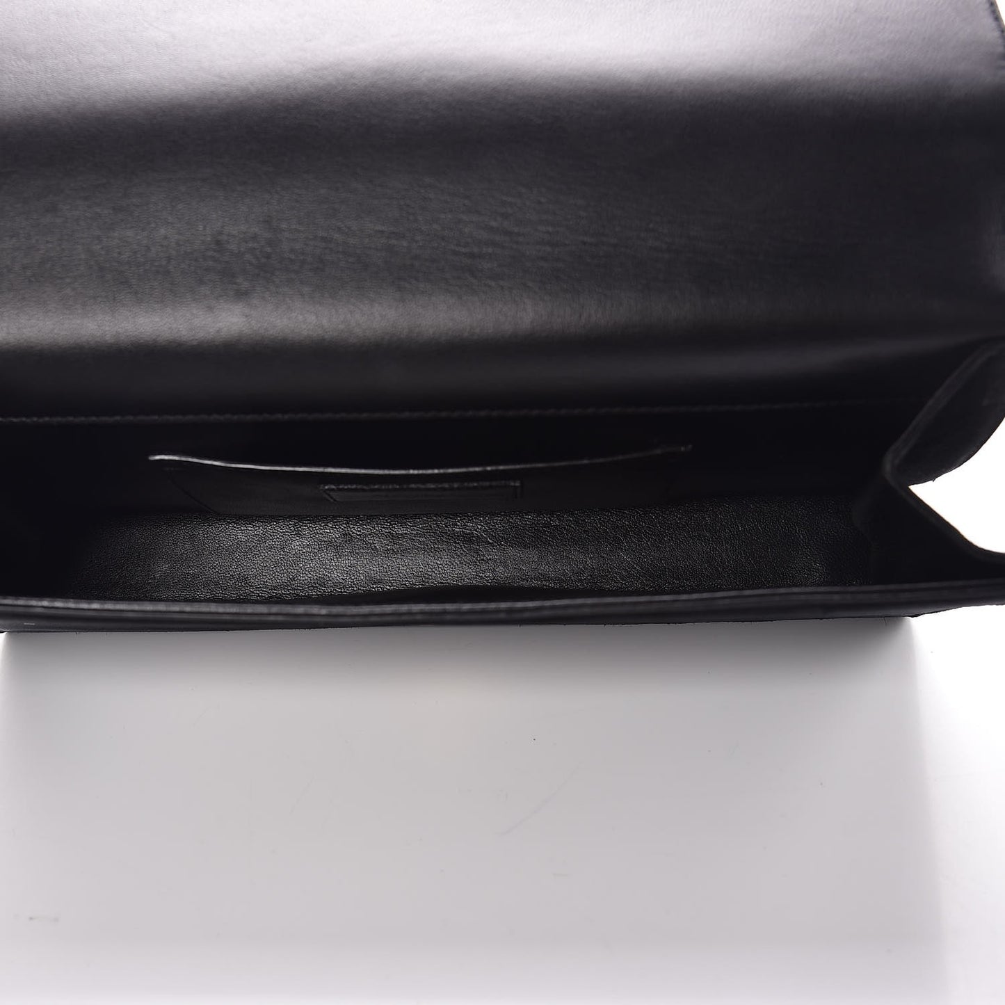 Suede Cassandre Tassel Clutch Black