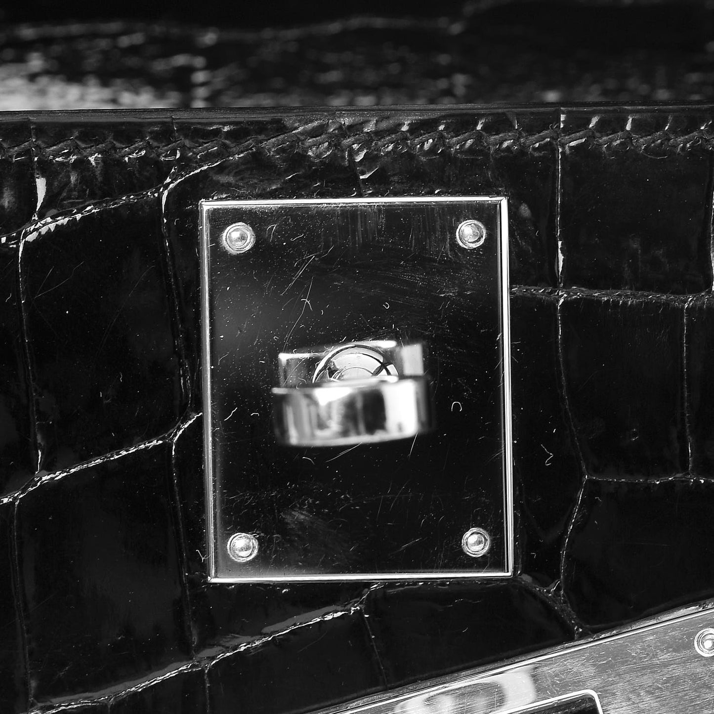 Shiny Niloticus Crocodile Kelly Cut Pochette Black