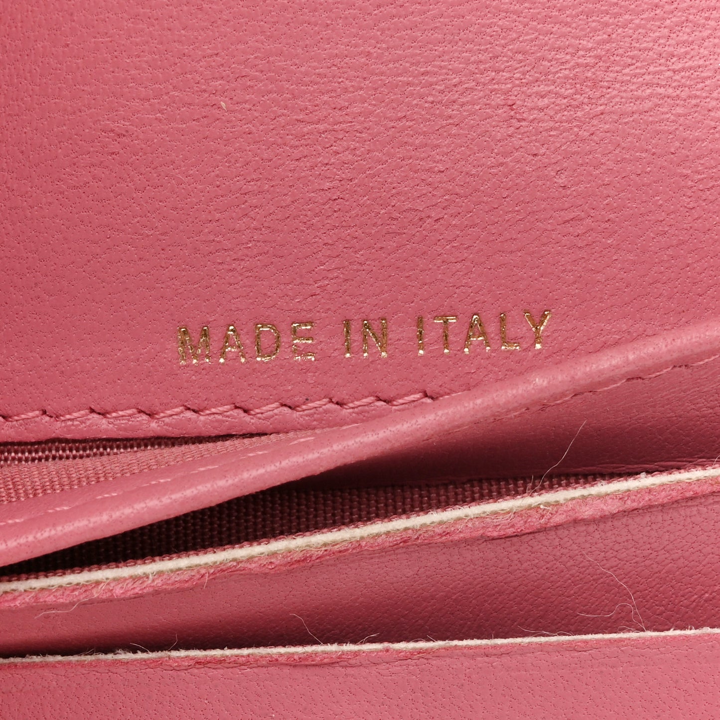 Calfskin Quilted Zip Around Bifold Wallet Pink