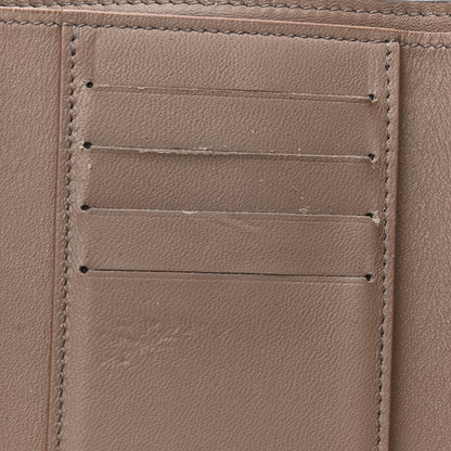 Louis Vuitton Taurillon Capucines Compact Wallet Magnolia 8 of 9