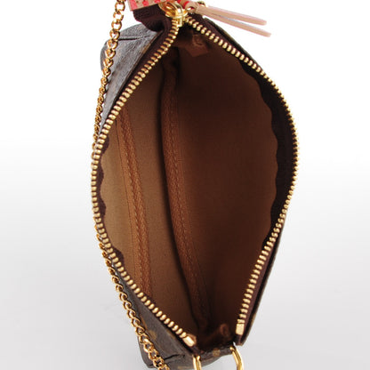 Louis Vuitton Monogram Trunks and Locks Mini Pochette Accessories 5 of 8