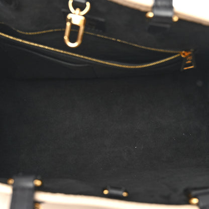 Louis Vuitton Empreinte Monogram Giant Broderies Onthego MM Cream Black 5 of 9