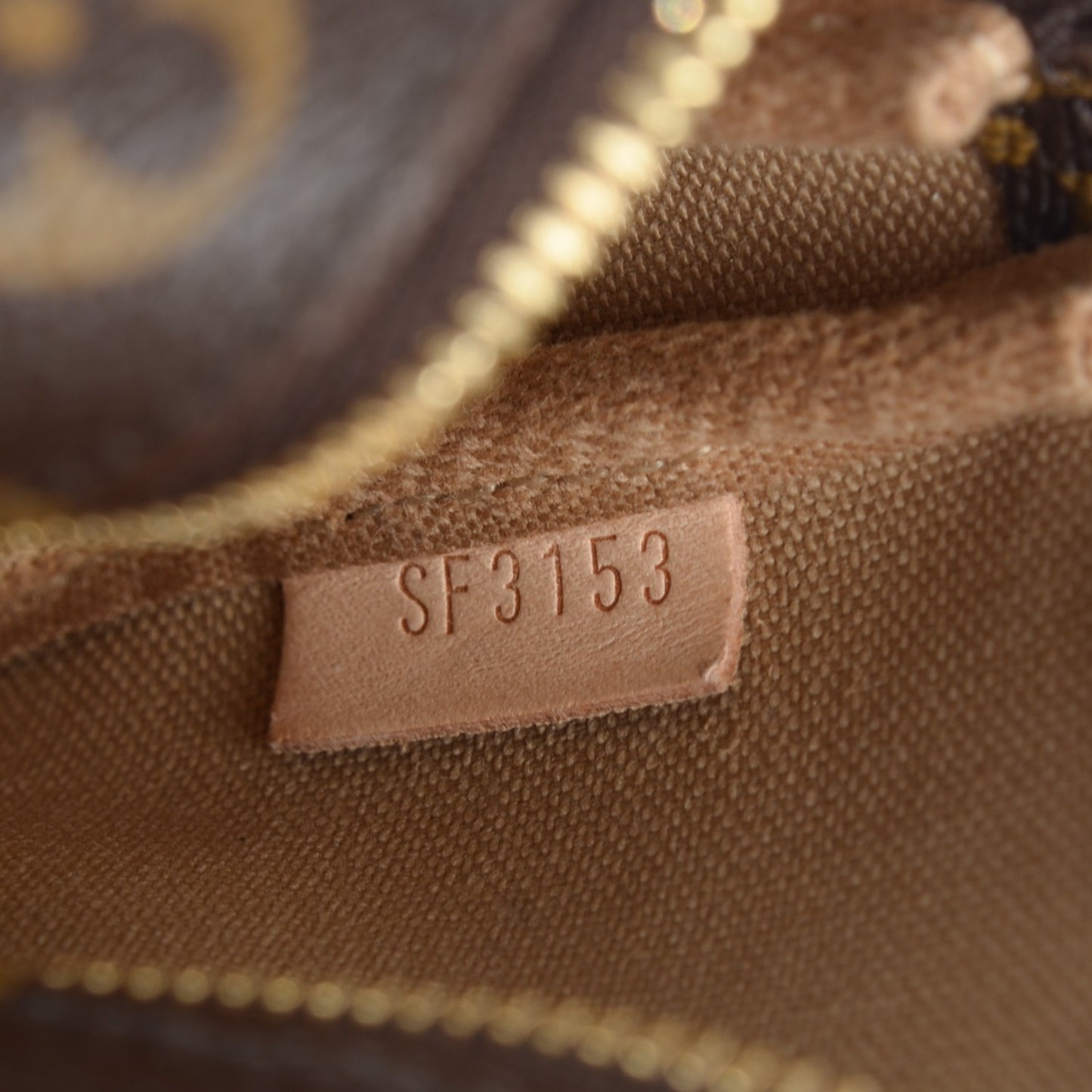 Monogram Trunks and Locks Mini Pochette Accessories