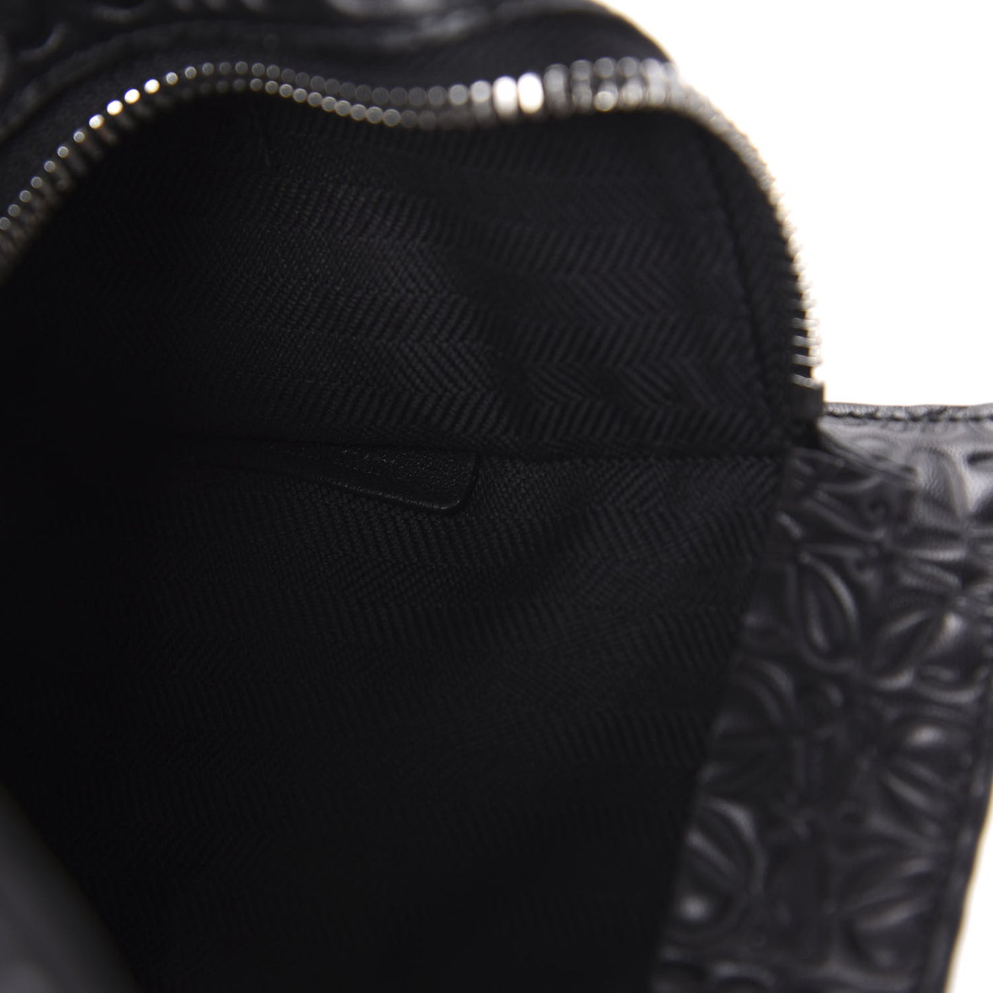 Calfskin Embossed Repeat T Pouch Black