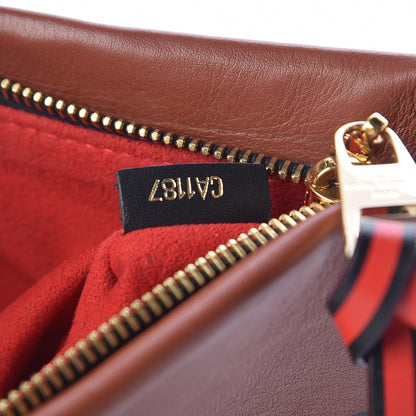 Louis Vuitton Monogram Tuileries Pochette Caramel 7 of 7