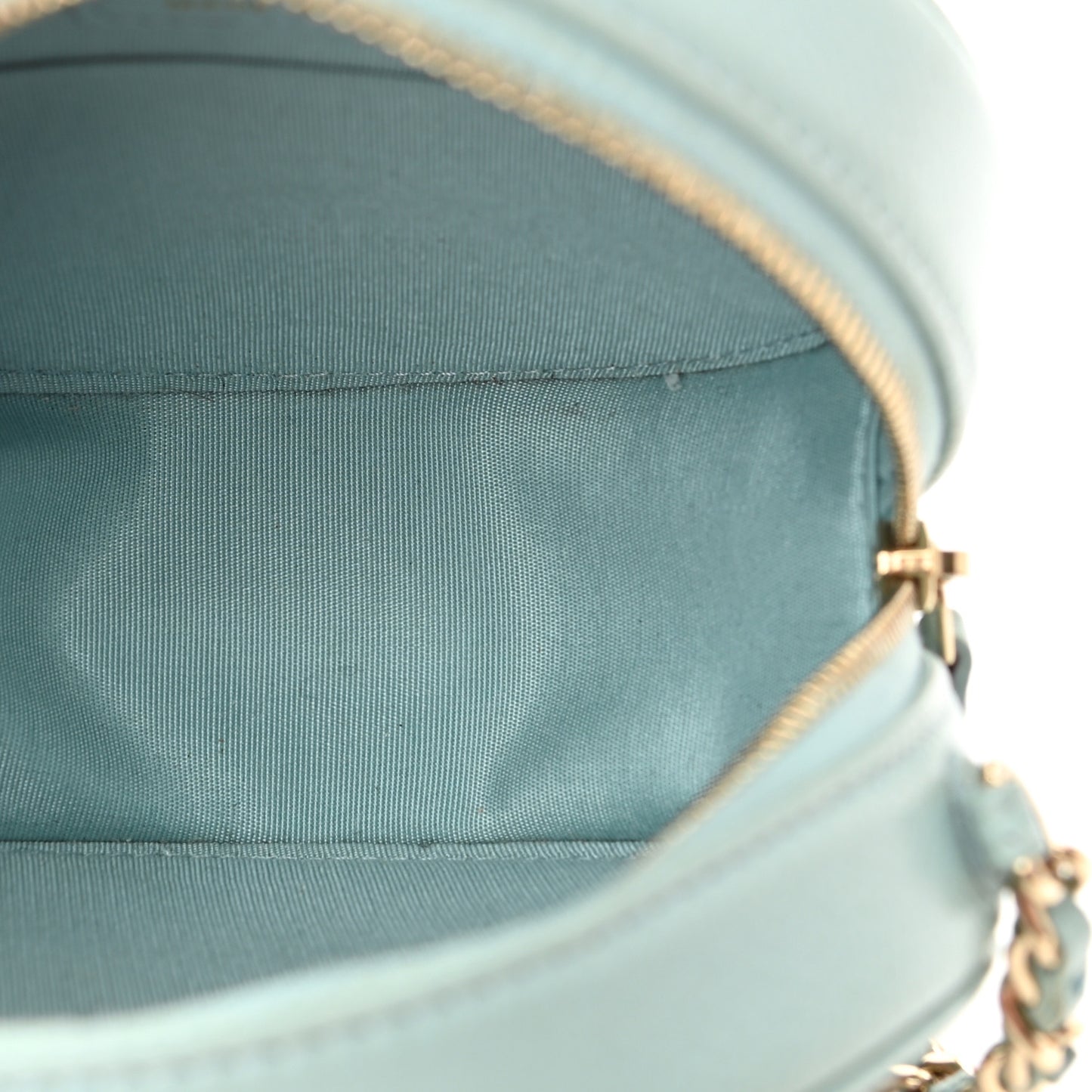 Caviar Camellia Embossed Round Clutch With Chain Light Blue