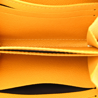Louis Vuitton Monogram 2022 Christmas Animation New York Soho Zippy Coin Purse Yellow 5 of 7