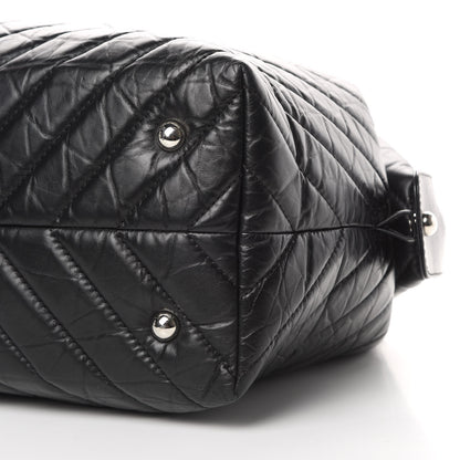 Chanel Aged Calfskin Chevron Quilted Duffle Bag Black 10 of 12
