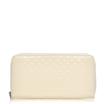 Louis Vuitton Shiny Calfskin Damier Facette Zippy Wallet Creme 1 of 6
