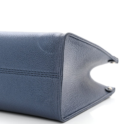 Louis Vuitton Metallic Empreinte Monogram Giant Onthego PM Navy Nacre 9 of 9