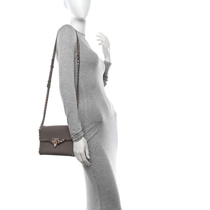 Valentino Garavani Pebbled Calfskin Medium Rockstud Flip Lock Crossbody Bag Poudre 2 of 10
