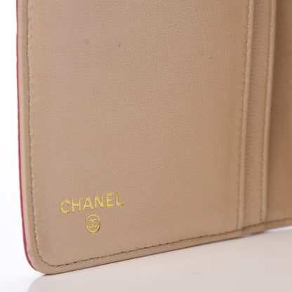 Chanel Lambskin Camellia Embossed Yen Wallet Fuchsia 6 of 10
