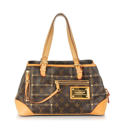 Louis Vuitton Monogram Riveting 1 of 8
