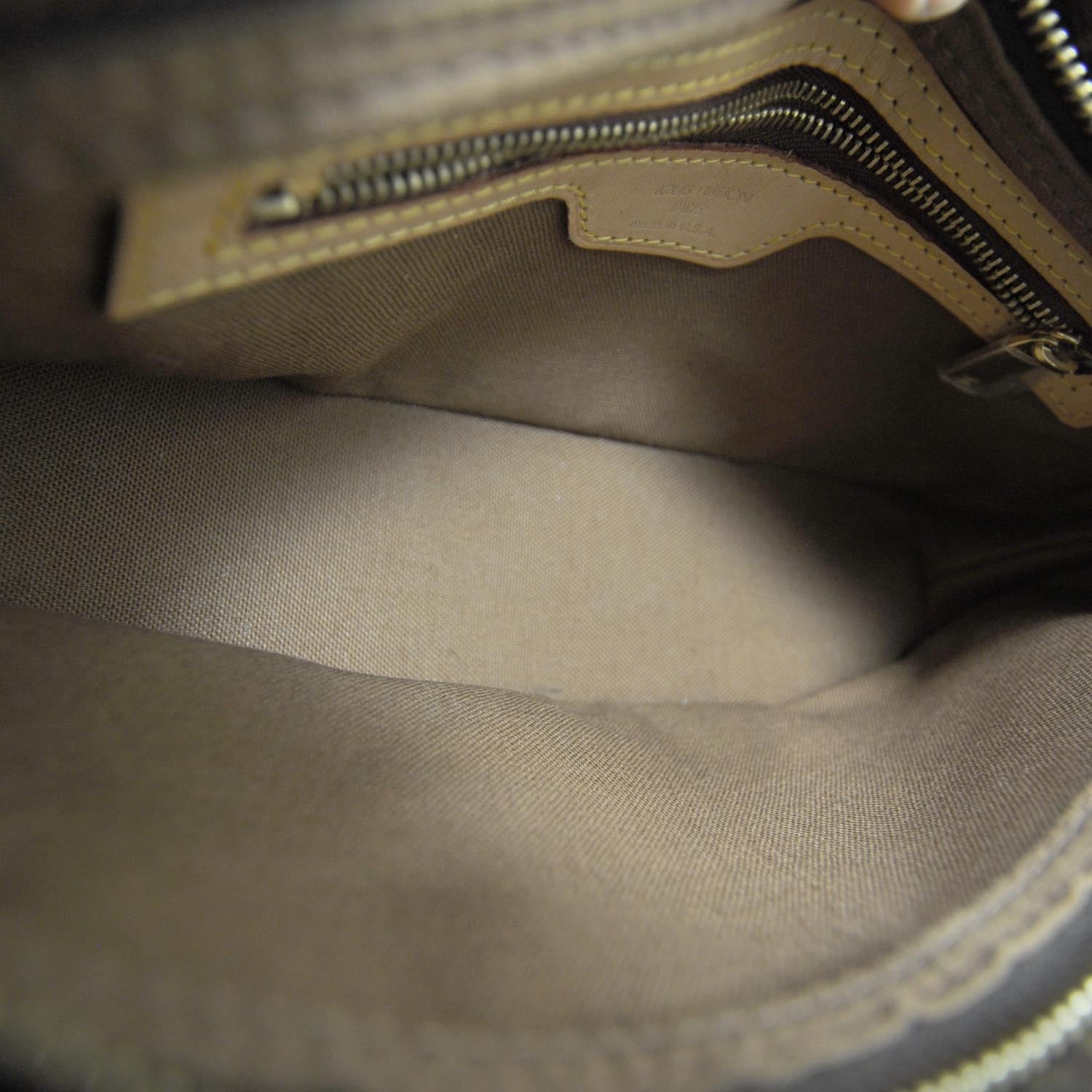 Louis Vuitton Monogram Trotteur 6 of 8