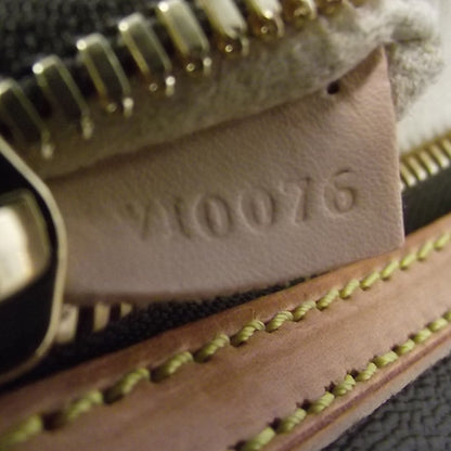 Louis Vuitton Monogram Hudson GM 8 of 9