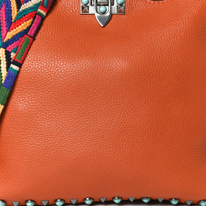 Valentino Garavani Pebbled Calfskin Small Guitar Strap Rockstud Rolling Flip-Lock Messenger Bag Orange 8 of 10