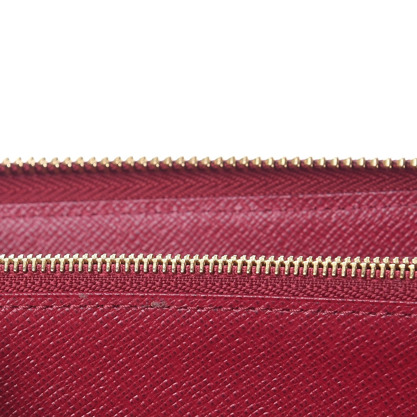 Monogram Pompon Zippy Wallet Fuchsia