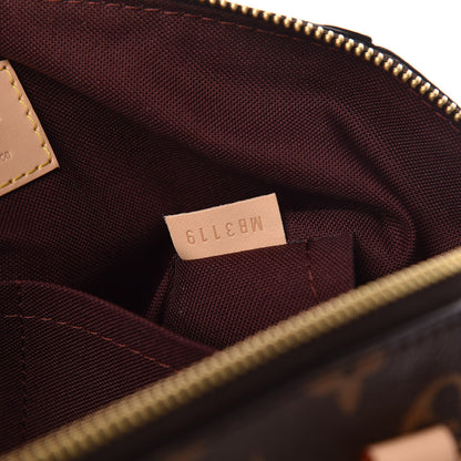 Louis Vuitton Monogram Rivoli MM 7 of 11