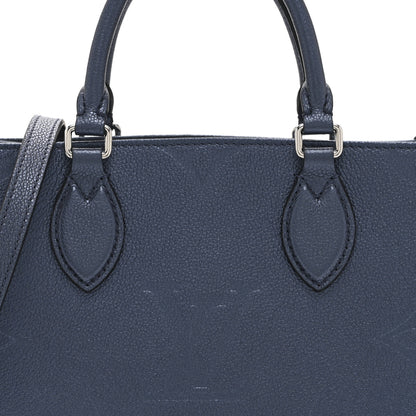 Louis Vuitton Metallic Empreinte Monogram Giant Onthego PM Navy Nacre 7 of 9