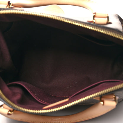 Louis Vuitton Monogram Rivoli MM 4 of 10