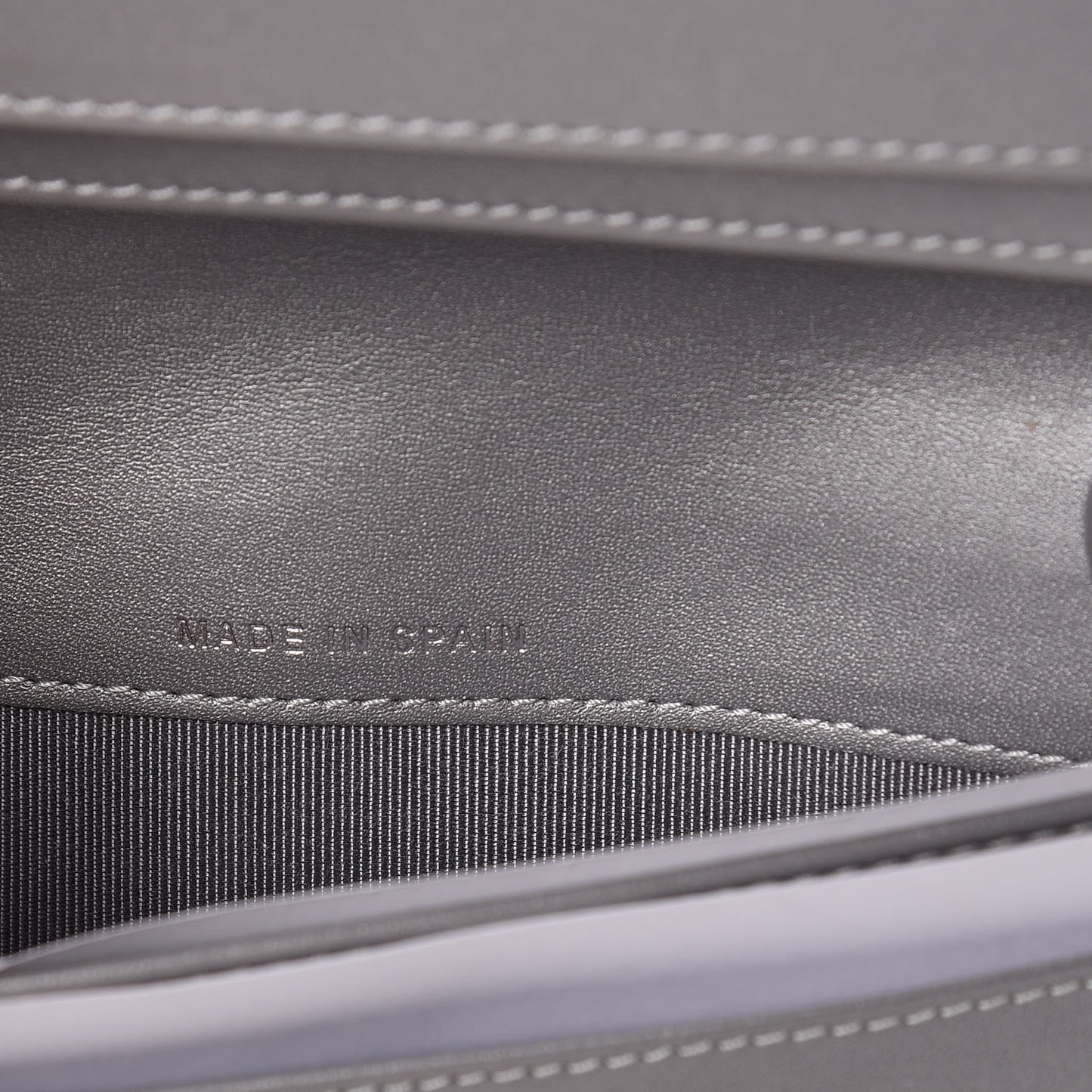 Metallic Aged Calfskin Stitched Reissue Yen Wallet Silver