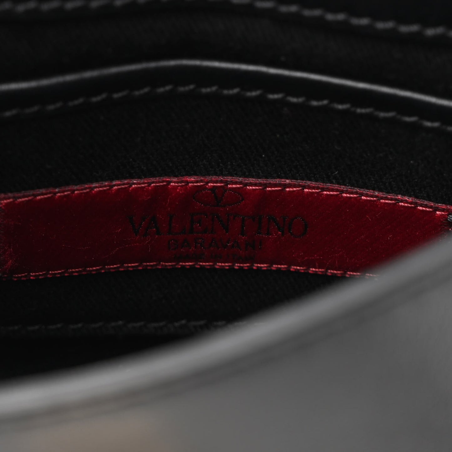 Vitello Mini Rockstud Flip Lock Crossbody Bag Black