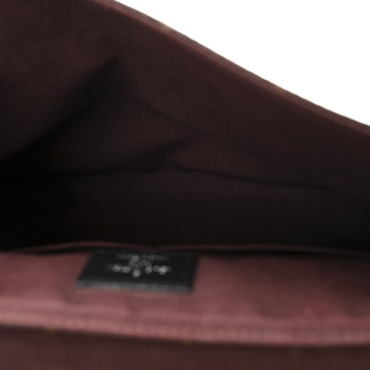 Monogram Macassar District PM