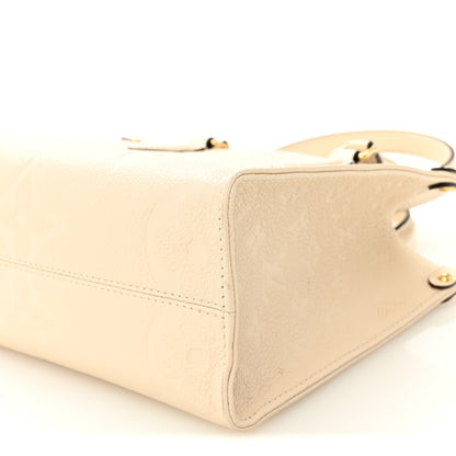 Louis Vuitton Empreinte Monogram Giant Onthego PM Cream Beige 9 of 9