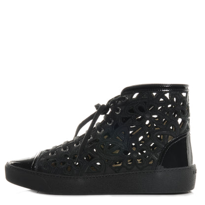 Chanel Patent Grained Goatskin Hollow Out Flower Sneakers Black 39 1 of 6