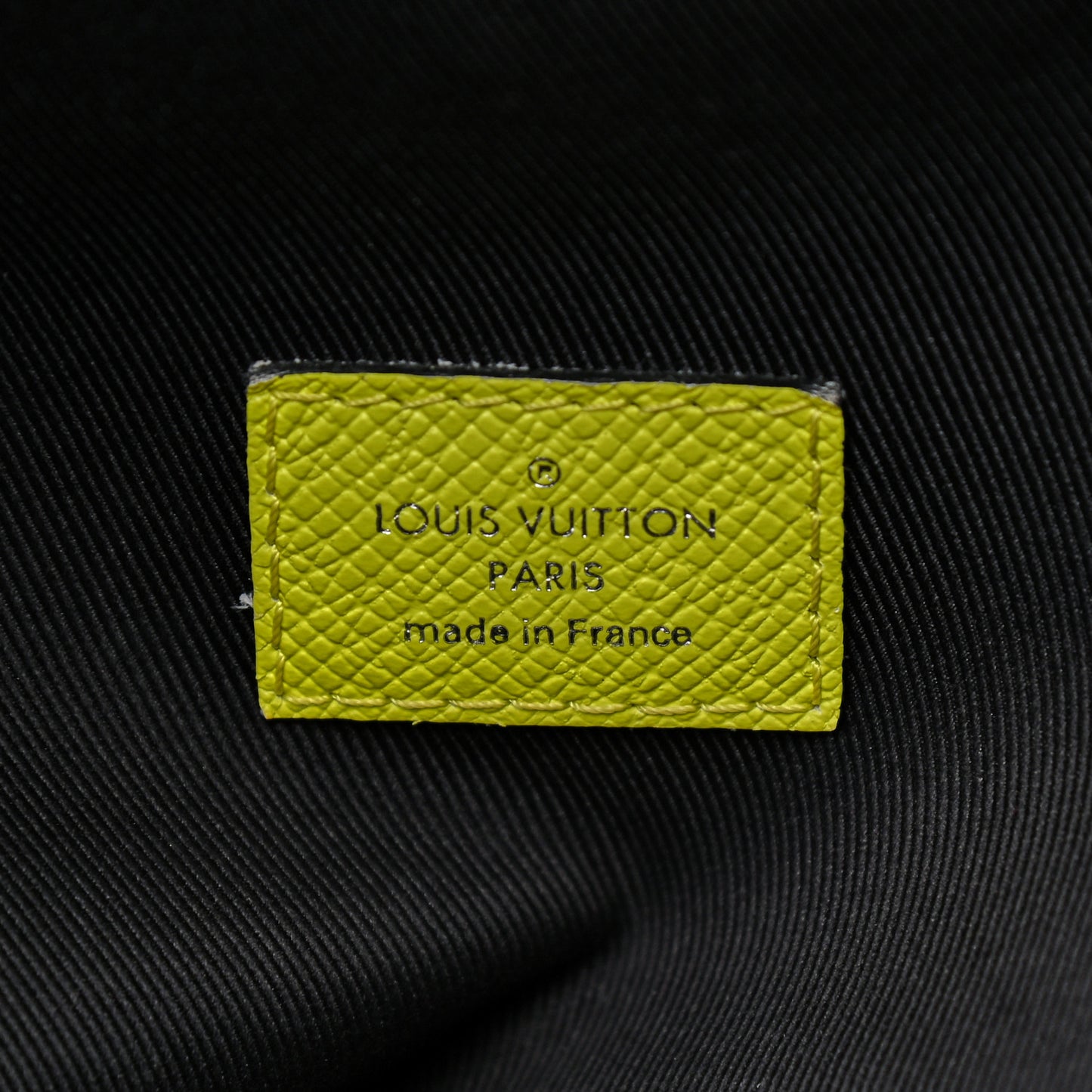 Taiga Monogram Discovery Backpack PM Yellow
