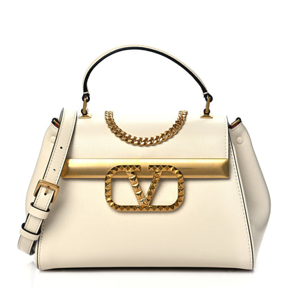 Valentino Garavani Grainy Calfskin Small Rockstud Alcove Top-Handle Bag Light Ivory 1 of 10