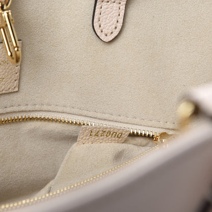 Louis Vuitton Empreinte Monogram Giant By The Pool Onthego MM Cream Saffron 9 of 10