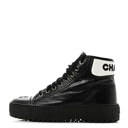 Chanel Aged Calfskin Lace Up Cap Toe Sneakers 38.5 Black White 1 of 9