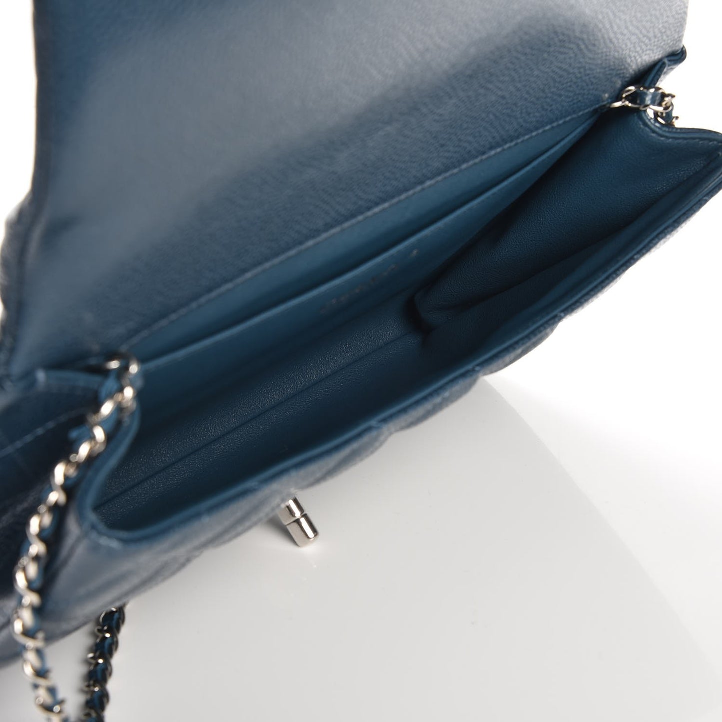 Iridescent Caviar Quilted Clutch With Chain Flap Blue