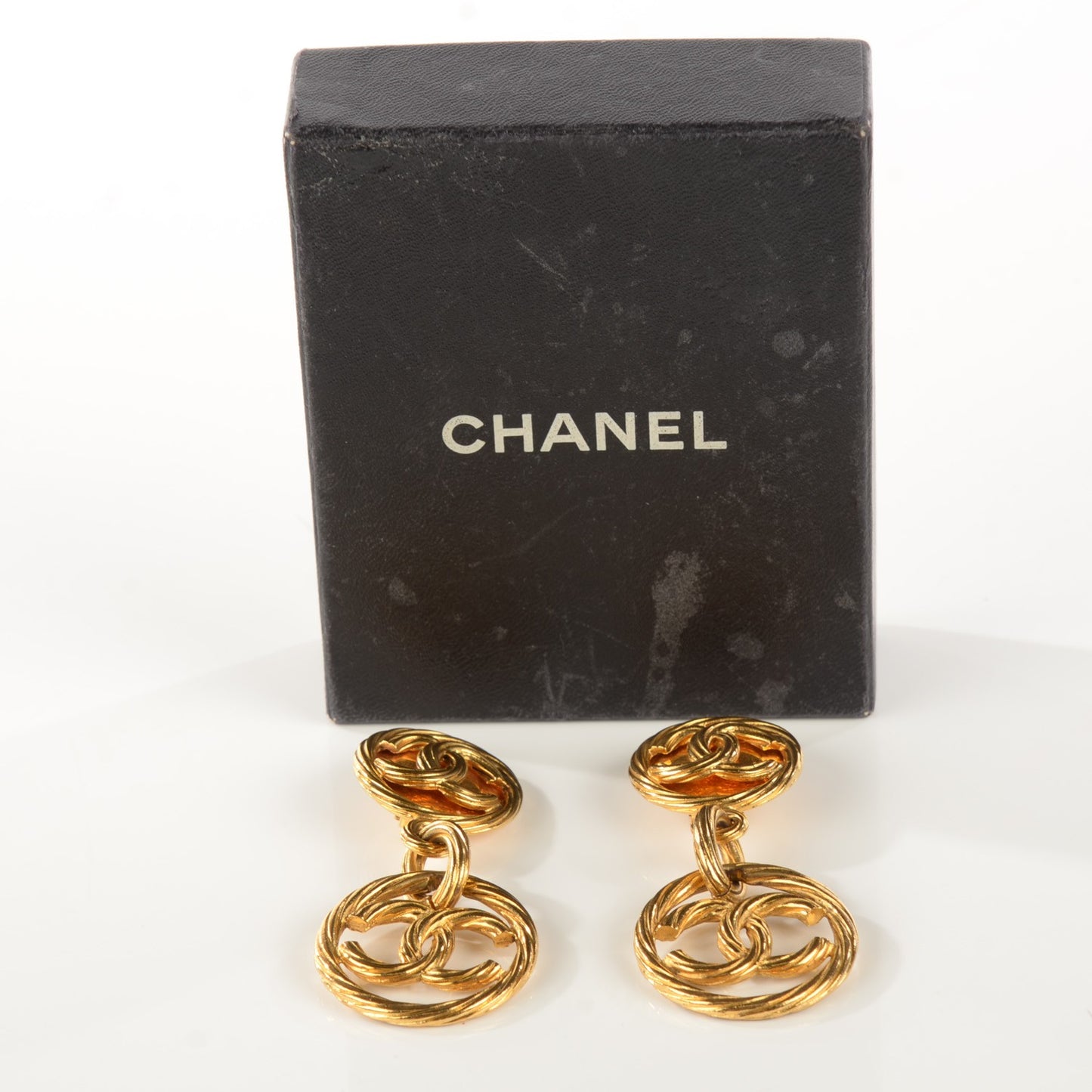 Twisted CC Clip On Drop Earrings Gold