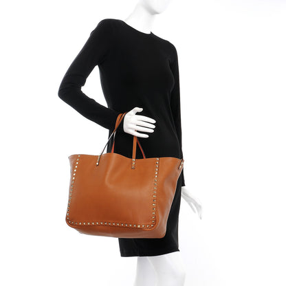 Valentino Garavani Pebbled Calfskin Medium Rockstud Reversible Tote Light Cuir Coral 3 of 11