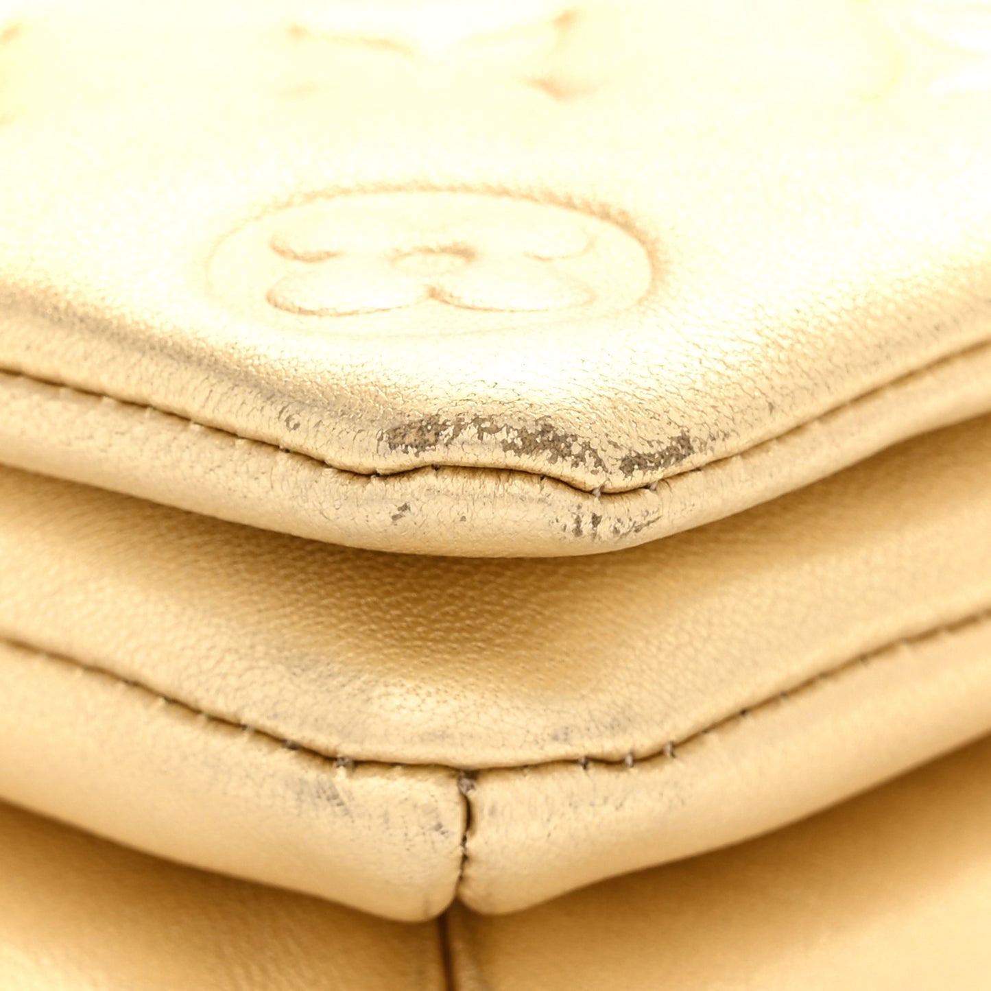 Metallic Lambskin Embossed Monogram Pochette Coussin Gold