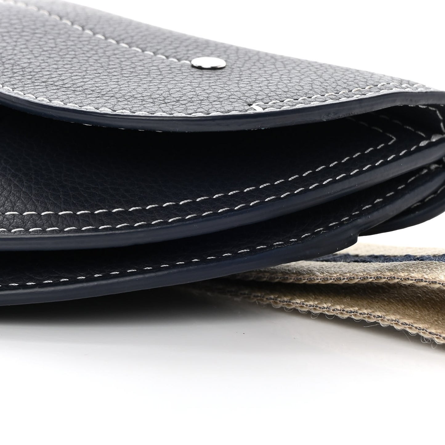 X KAWS Grained Calfskin Saddle Wristlet Blue