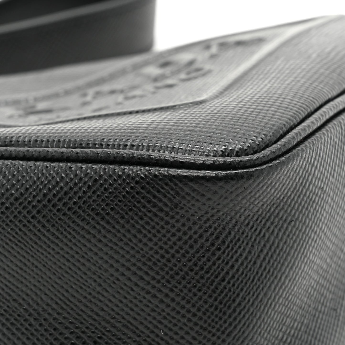 Saffiano Cuir Triangle Logo Embossed Triangle Wristlet Black