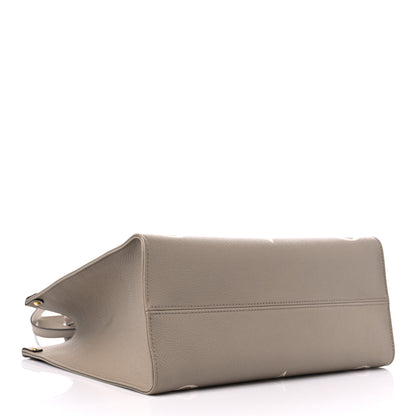 Louis Vuitton Empreinte Monogram Giant Onthego MM Tourterelle Creme 4 of 10