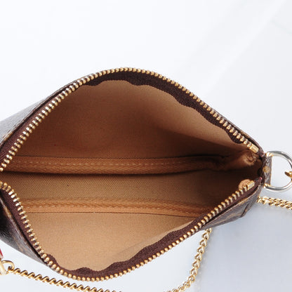 Louis Vuitton Monogram Trunks and Locks Mini Pochette Accessories 6 of 7