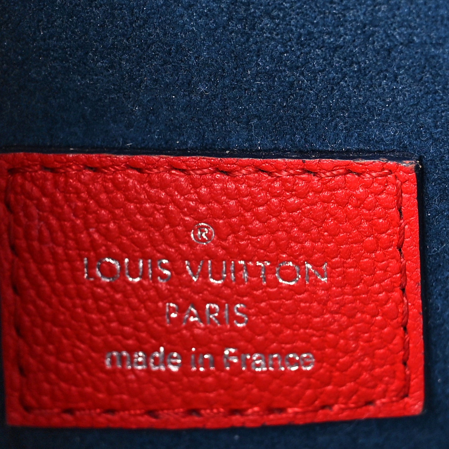 Epi Twist Tote Coquelicot
