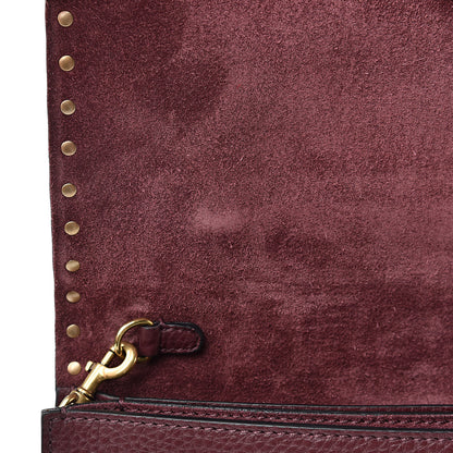 Valentino Garavani Pebbled Calfskin Rockstud Rolling Wristlet Clutch Rubin 8 of 11